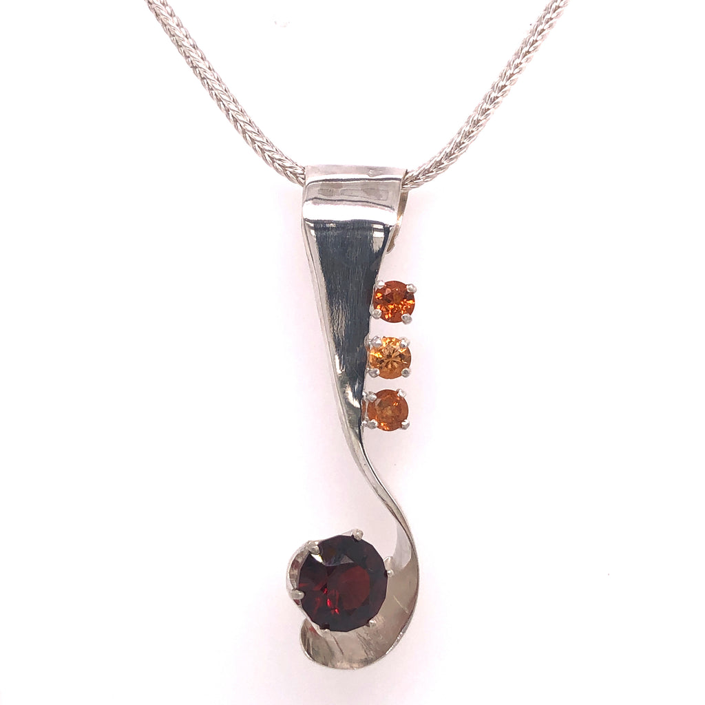 Forged sterling with garnets