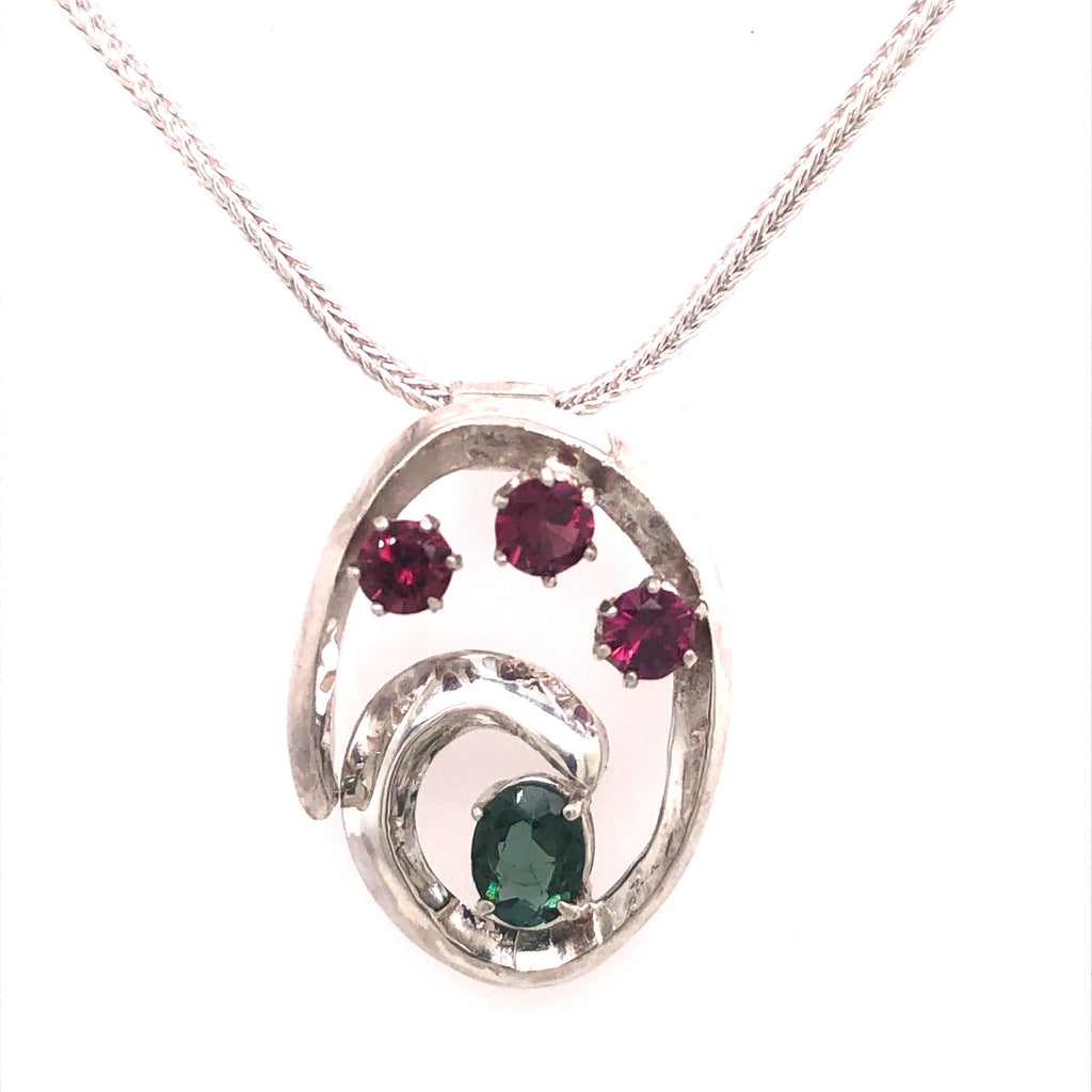Forged sterling with tourmalines